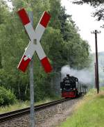 Von Sellin West kommend passiert 99 1781-6 gerade Km 52.2 12.07.2014 11:17 Uhr.