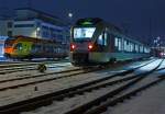 ET 23007 (3-teiliger Stadler Flirt) der Abellio Rail NRW ist am 08.02.2013 (0:05 Uhr) beim Hbf Siegen abgestellt, dahinter ein 5-teiliger Flirt 429 544 / 044 der HLB (Hessischen Landesbahn).