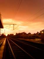 Unheimliches Morgenrot nach einem sehr heftigen Platzregen als ich am Bahnhof Dillignen (Donau) am 23.08.2007 auf den 6.24 Uhr Zug nach Donauwrth wartete