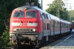 Alte Bilder: Die 218 206-1 zieht den RE12 von Kln Messe/Deutz nach Trier in Kln West am 15.08.2009