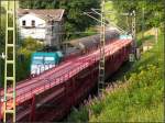 Rush Hour auf der Montzenroute bei Reinhartzkehl (Aachen). Richtig viel Verkehr
in beiden Richtungen erlebt man oft Freitags in den frhen Abendstunden.
Zu sehen die Zugpferde der Belgier ..Traxx Lokomotiven (E-186) vom Unternehmen Cobra. Aufnahme vom August 2012.