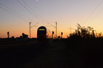 Nachschuß auf einen RE4 nach Aachen Hbf der seinen Weg in die untergehenden Sonne macht am Abend des 5.10.2016