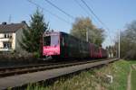 7755 Telekom Express legt als SL66  sich in Bonn Oberkassel in die Kurve.
