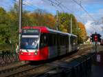 Tw 5118 als Linie 13 in Buchheim Herler Strae. Aufgenommen am 25.10.2009