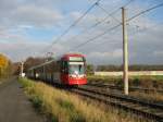 2 unbekannte Wagen vom Typ K5100 am 08. November 2009 als Linie 13 mit Ziel  Oskar-Jger-Strae / Grtel  zwischen den Haltestellen  Wischheimerstrae  und  Herler Strae .