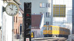  Zeit im Blick behalten 

EIn Blick vom U-Bahnhof  Gleisdreieck  Richtung Osten offenbart einen Zug der Baureise A3L 92 bei der  Durchfahrt  unter dem BVG-Werbeschild auf der Linie U1/U3.

Berlin, der 08.02.2020