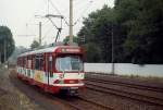 Fernbahnlinien der Düsseldorfer Rheinbahn: GT8S 3027 als Linie K von Krefeld nach Düsseldorf Ende der 1970er Jahre in der Haltestelle Haus Meer (heute  Forsthaus ).