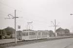 Vierachsiger Umbaugelenktriebwagen 1208 auf der Forststrae in Duisburg Wanheimerort im Einsatz auf der Linie 4.