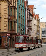   Die ČKD Tatra Kurzgelenktriebwagen KT4D Nr.512 und 530 der Erfurter Verkehrsbetriebe (SWE EVAG) am 30.04.2016 auf Stadtrundfahrt erreichen bald den Hauptbahnhof Erfurt.