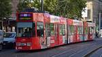 Freiburg im Breisgau - Straßenbahn Düwag 260 - Aufgenommen am 12.10.2018 | Die Vollwerbung zeigt in roter Farbe und Porträt.