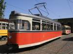 Dieser Gotha-Groraumwagen mit der Nummer 218 001-2 wurde Anfang der 60er Jahre im VEB-Waggonbau Gotha gebaut und gehrt heute zum Bestand der historischen Straenbahnen in Berlin. Diese Fahrzeuge waren noch bis 1995 zwischen Kpenick und Alt-Schmckwitz im Planeinsatz. 
(ausgestellt im Betriebshof Berlin-Niederschnhausen 19.05.2007)