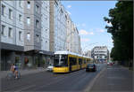 Vorbei an Plattenbauten -     Flexity Tram in der Rosenthaler Straße in Berlin.