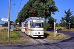 Brandenburg Tw 134 mit Bw 260 auf dem Weg nach Plaue und Kirchmser entlang der B1 an der Abzweigung Briester Weg, 11.07.1994.