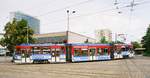 02. August 2003	Cottbus, Tw 130 der Straßenbahn bedient die Linie 2 und biegt vor der Stadthalle aus der Berliner in die Friedrich-Ebert-Straße ein. Scan vom Color-Negativ