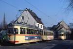 Dsseldrf Tw 2101 mit Bw 1601 kurz nach Verlassen der Endschleife Unterrath in der Unterrather Strae, 03.05.1987.