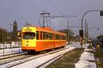 Duisburg Tw 1000 auf der Linie 904 in Angerhausen, 08.02.1986.