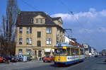 Der Essener Tw 1623 ist auf der damaligen Gemeinschaftslinie 104 in Mhlheim in der Aktienstrae stadteinwrts unterwegs, 02.04.1987.