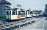 VAG Freiburg___Betriebshof Nord (Komturstraße):längs der Wagenhalle abgestellte Verbands-Tw  [Rastatt, 1951-53].__20-04-1974