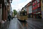 Der historische Triebwagen 100 der Freunde der Freiburger Straenbahn, kurz FdFS, konnte ich am frhen Abend des 11.05.14 kurz vor dem Martinstor auf dem Weg in Richtung Betriebshof Sd bildlich