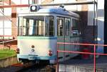 Der ehemalige Betriebshof Thielenbruch ist in 2 Hallen unterteilt. In der ersten Halle ist das Straenbahnmuseum Klns zuhause. In der anderen Enden heute die Straenbahnen der Linien 18 und 3. Wenn man aus der Halle nach drauen will muss man duch das Heck eines Klner GT8 das in die Hauswand hineingebaut wurde. Die Falttre ist funktionsfhig und ffnet sich per Bewegungssensor.