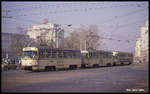 Dreiteiliger Tatra Zug am 2.4.1990 mit Motorwagen 1060 voraus auf der Linie 4 in Magdeburg unterwegs auf der Karl Marx Straße.
