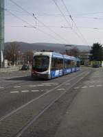 Eine RNV Variobahn im OEG Design mit Werbung am 25.03.11 in Heidelberg Hbf