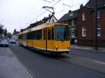 Ein DUEWAG-Stadtbahnwagen M8 der Mlheimer Verkersgesellschaft auf der Zeppelinstrae in Mlheim (Ruhr) als Zug der Linie 104 zum Flughafen am 7.