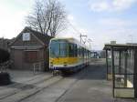 Ein DUEWAG-Stadtbahnwagen M6 der Mlheimer Verkehrsgesellschaft am Mlheimer Flughafen als Wagen der Linie 110 zur Friesenstrae - 01.03.2003.