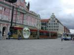 Vergolden sie ihre Trume - 50 Jahre Lotto steht auf dem Tram am Neuen Markt vor dem Rathaus Rostock.