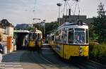 So war der Feuerbacher Bahnhof früher...Ein Sonderzug mit TW 802 (Serie T2) und ein Zug aus zwei GT4 warten noch auf Fahrgäste.