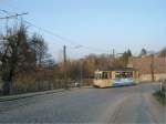 Triebwagen 32 ist am nachmittag des 27.03.2002 zwischen Woltersdorf Schleuse und dem Thlmannplatz als Solotriebwagen unterwegs. 