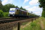 146 541-8 der metronom Eisenbahngesellschaft mbH als ME 82117 (RE3) von Hamburg Hbf nach Uelzen in Radbruch auf der Bahnstrecke Hannover–Hamburg (KBS 110).