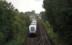 NOB81731 (Westerland(Sylt)-Hamburg Altona) mit Schublok 223 015-9  bei Morsum 7.8.12