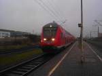 RE 21423 von Lbeck Hbf nach Hamburg Hbf bei der Ausfahrt am 6.12.08 in Bad Oldesloe.