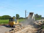 Staubiges von der Baustelle, zurzeit wird an der Baustelle Nassenheide-Lwenberg am 24.07.2013 das Schotterplanum hergestellt.