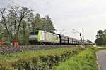 Captrain 185532-9 mit Werbung Dompteur gesucht erreicht hier mit einem langen Kohlezug den Ortsrand von Hasbergen. Der Zug ist am 4.5.2022 um 10.09 Uhr unterwegs in Richtung Ruhrgebiet.