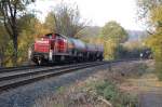 294 772-9 fhrt am 29.10.2010 mit FZT 54358 Paderborn Gbf - Ottbergen, und wird gleich den B Alleestrae in Bad Driburg berqueren.