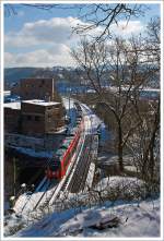 Zwei Hamster (zwei gekuppelte Tallent 2, je ein 3 und 4-teiliger ) als RE 9 (rsx - Rhein-Sieg-Express)  Siegen - Köln - Aachen fährt in Richtung Köln, hier am 13.03.2013 auf der