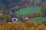 Eine 111er mit dem RE 9 am 01.11.2011 hinter Kirchen-Freusburg, sie fhrt auf der Siegstrecke Richung Siegen. Die Aufnahme entstand vom Ottoturm bei Kirchen-Herkersdorf.