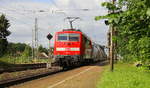 Ein Nachschuss von der 111 121 DB schiebt den RE4 aus Aachen-Hbf nach Dortmund-Hbf und kommt aus Richtung Aachen-West,Laurensberg,Richterich, und fährt durch Kohlscheid in Richtung