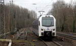 Ein Holländischer Regionalzug aus Aachen-Hbf(D) nach Maastricht(NL) und kommt aus Richtung Aachen-West,Laurensberg,Richterich und fährt durch Kohlscheid in Richtung Herzogenrath. Aufgenommen von Bahnsteig 1 in Kohlscheid. 
Bei Regenwolken und Sturm am Vormittag vom 4.3.2019.