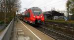 442 759 von DB kommt aus Köln nach Aachen-Hbf und fährt durch Kohlscheid aus Richtung Herzogenrath und fährt die Kohlscheider-Rampe hoch nach Aachen-West.