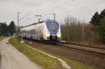 National Express RE7 im Gleisbogen vorm Bü Broicherseite auf seinem Weg nach Münster.