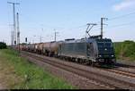 Kesselzug mit 185 570-9 der SBB Cargo International AG fährt in Großkorbetha auf der Bahnstrecke Halle–Bebra (KBS 580) Richtung Bahnhof Großkorbetha.