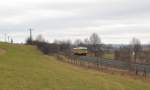 DB Netz Instandhaltung 726 002-9 + 725 002-0 als NbZ 94022 von Nebra nach Naumburg (S) Hbf, am 12.03.2012 im Unstruttal bei Laucha.