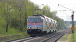 146 247 nähert sich mit einem RE54 nach Bamberg dem Haltepunkt Maintal-West.