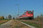 111 054 mit einer RB von Offenburg nach Basel am 27.03.17 in der Bahnhofseinfahrt von Müllheim (Baden).