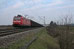 185 100-5 mit einem leeren Red-Bull-Zug nach sterreich am Abend des 27.03.13 bei Hgelheim.