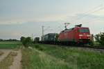 152 112-9 mit einem KLV-Zug gen Norden am Abend des 06.08.13 zwischen Mllheim (Baden) und Buggingen.