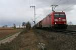 185 172-4 mit einem gemischten Gterzug gen Sden am Nachmittag des 28.02.14 in der nrdlichen Einfahrt von Mllheim (Baden).